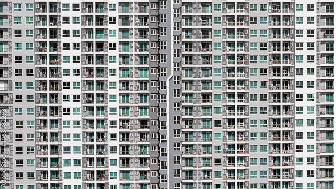 The boy fell 15 stories but only suffered a broken arm after bushes broke his fall.