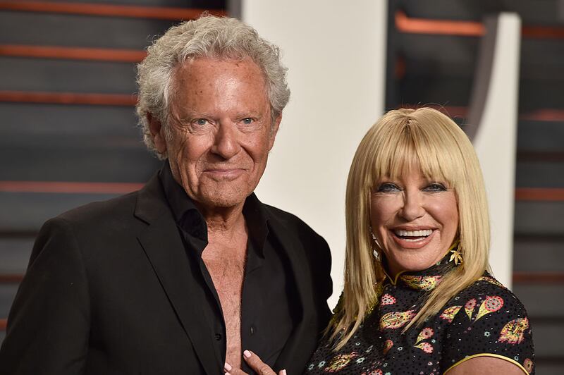BEVERLY HILLS, CA - FEBRUARY 28: Producer Alan Hamel (L) and actress Suzanne Somers attend the 2016 Vanity Fair Oscar Party Hosted By Graydon Carter at the Wallis Annenberg Center for the Performing Arts on February 28, 2016 in Beverly Hills, California. (Photo by Pascal Le Segretain/Getty Images)