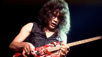 ddie Van Halen, of the group Van Halen, performs onstage in 1979 at the Aragon Ballroom in Chicago.